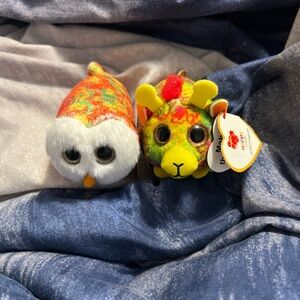 Happy meal Ty beanie babies. Mimi the owl and mabs the giraffe. Sold together.
